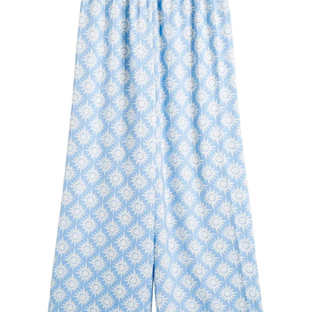 Брюки с принтом из коллаборации с Laura Whitmore