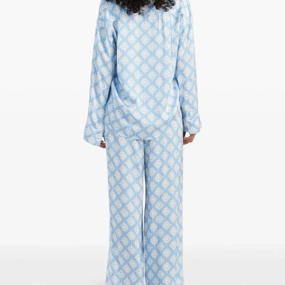 Брюки с принтом из коллаборации с Laura Whitmore