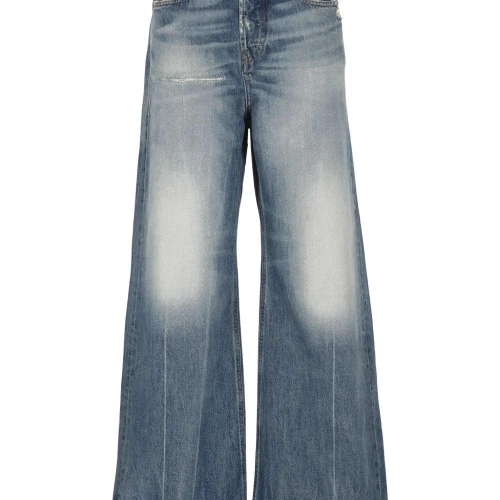 Широкие джинсы с эффектом потертости