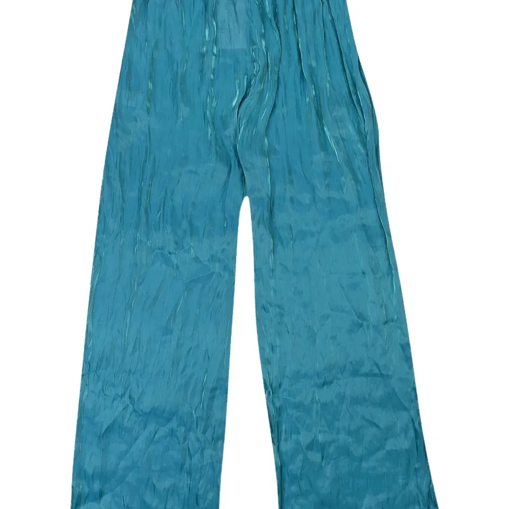 Брюки с переливчатым эффектом