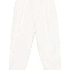 Зауженные брюки со складками