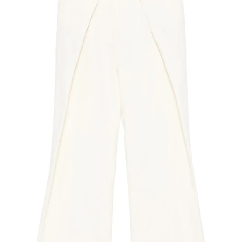 Широкие брюки со складками