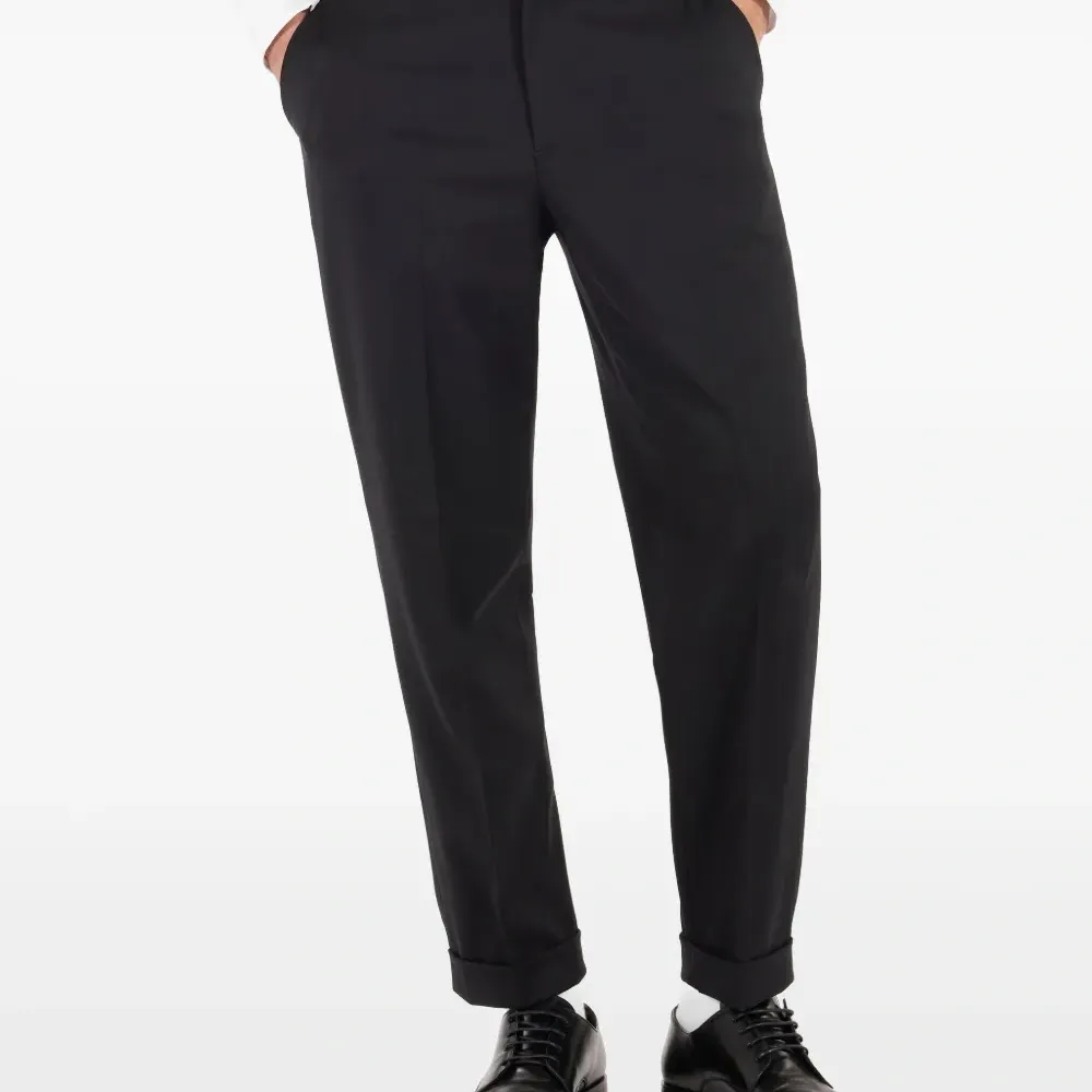 Укороченные брюки Укороченные брюки