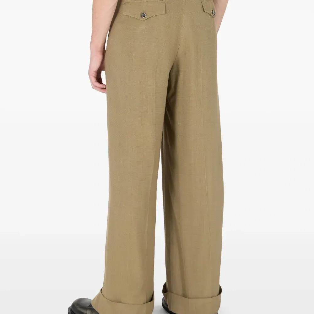 Брюки с драпировкой Брюки с драпировкой