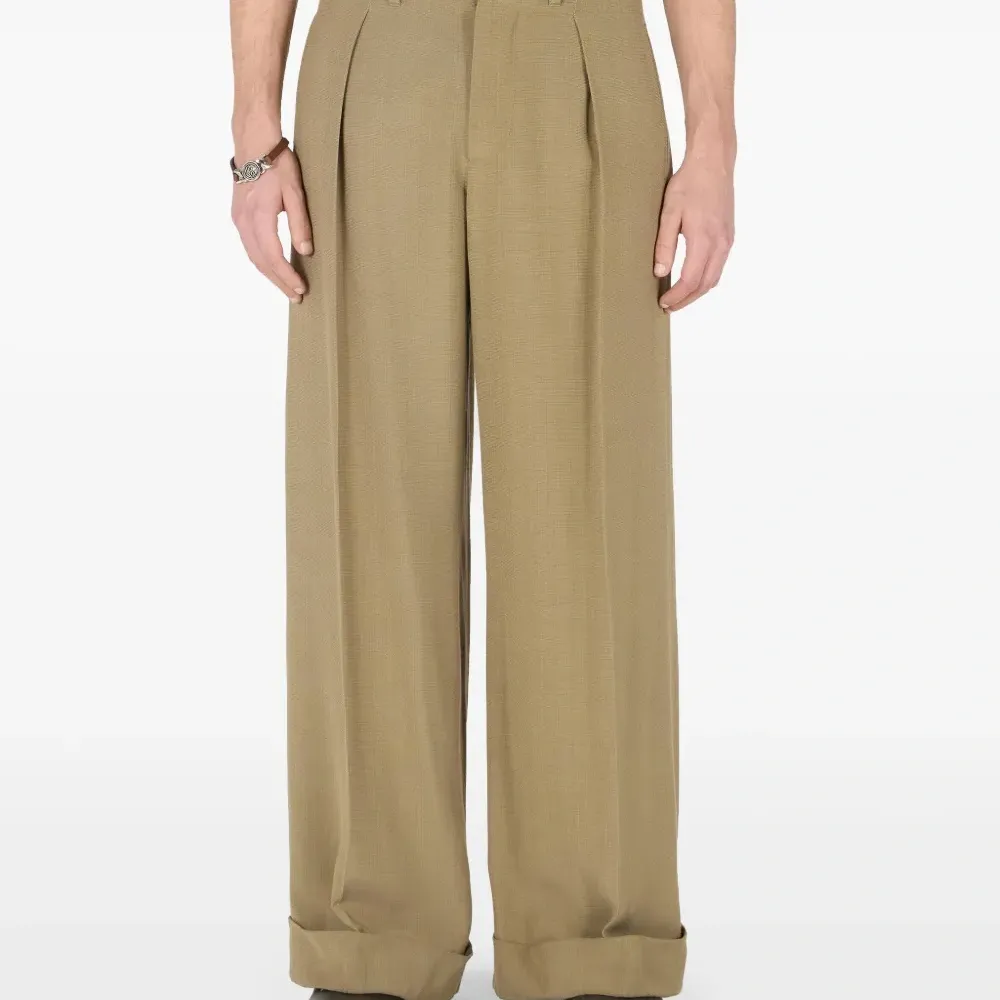 Брюки с драпировкой Брюки с драпировкой