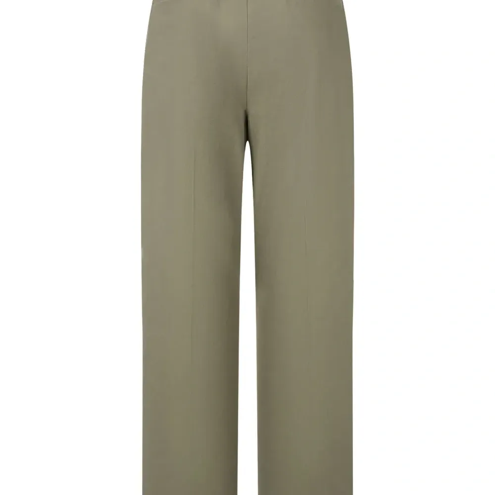 Брюки с защипами