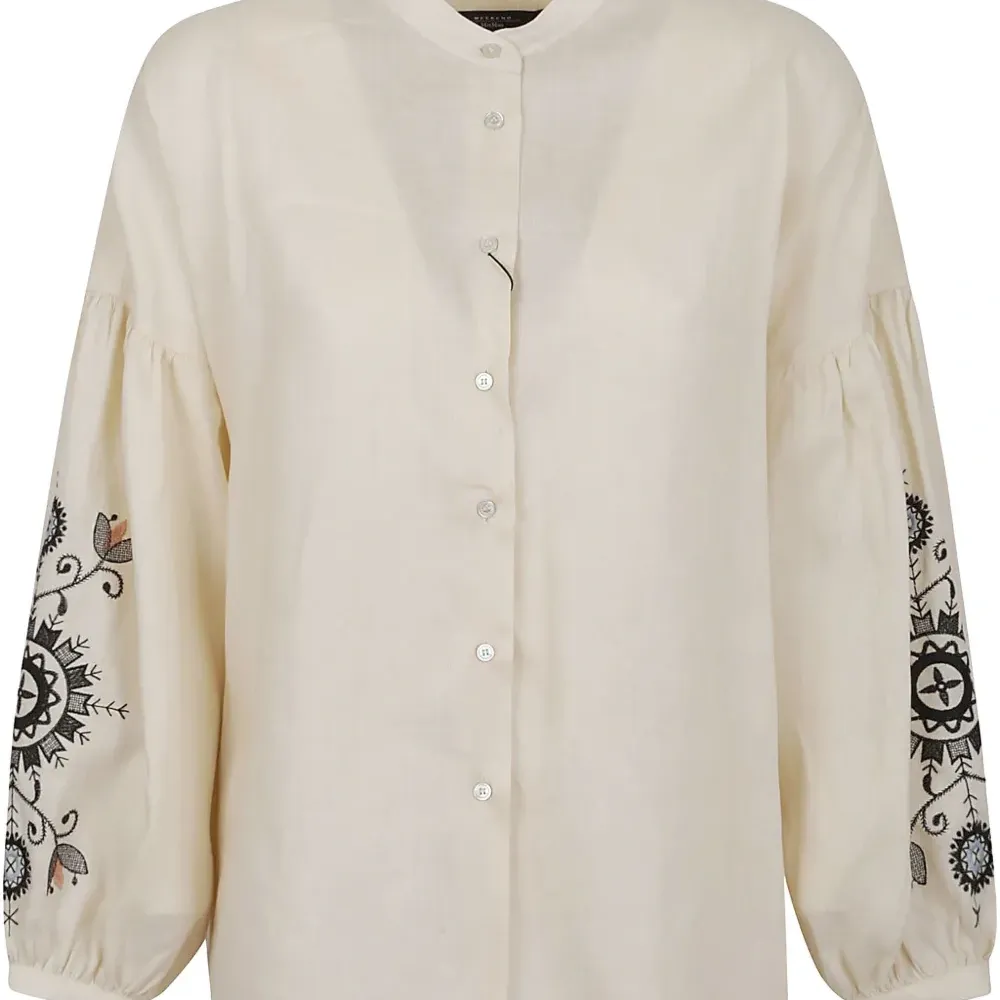 Блузка с декорированными рукавами