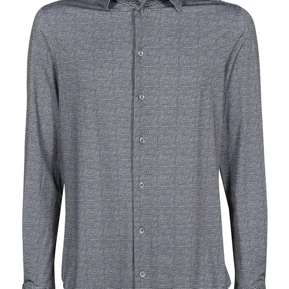 Рубашка в ломаную клетку