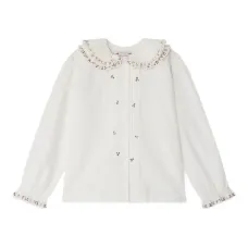 Блузка с оборками и вышивкой