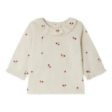 Блузка с оборками и вышивкой