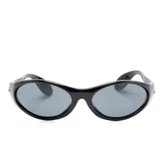 Солнцезащитные очки в овальной оправе Солнцезащитные очки в овальной оправе