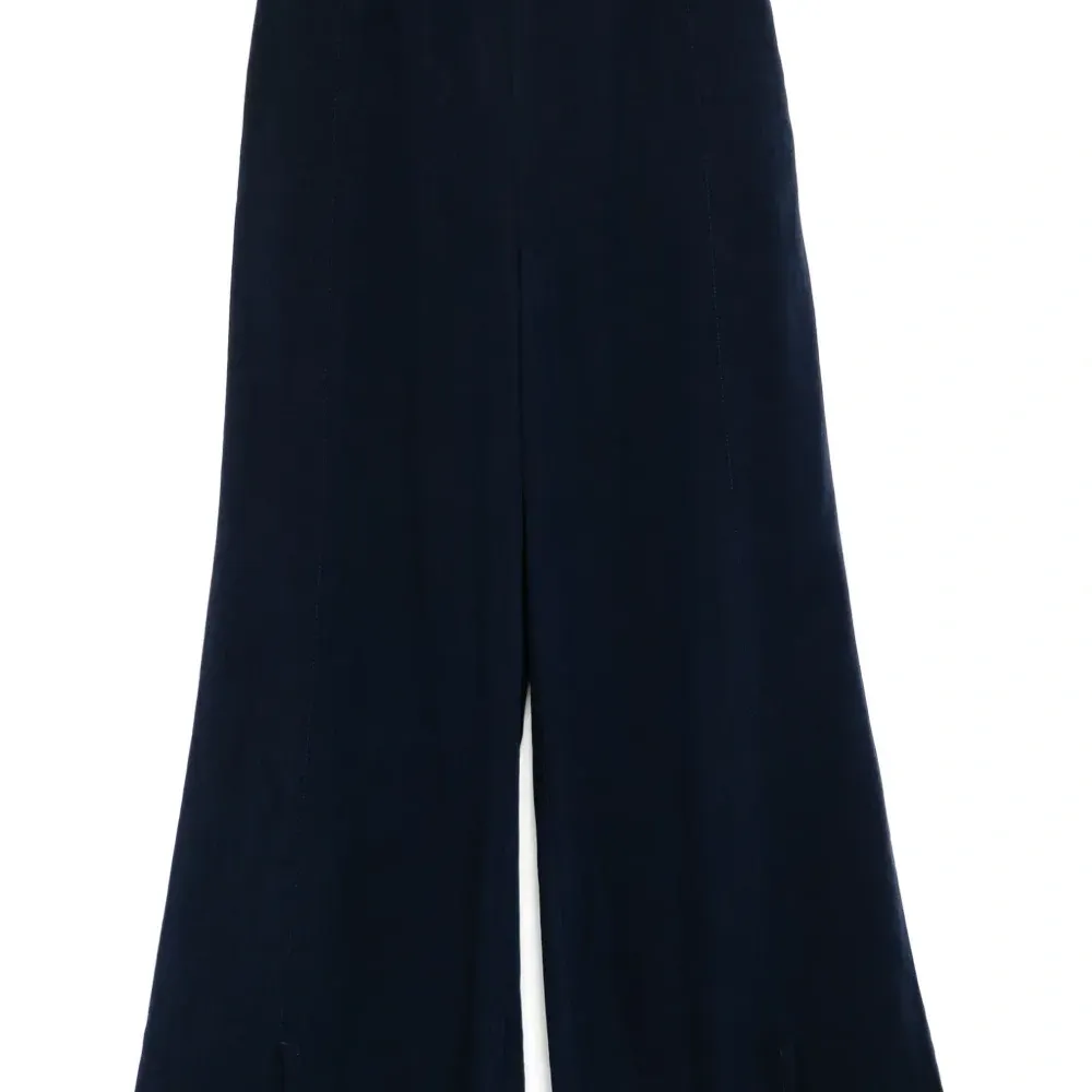 Брюки с вышитым логотипом