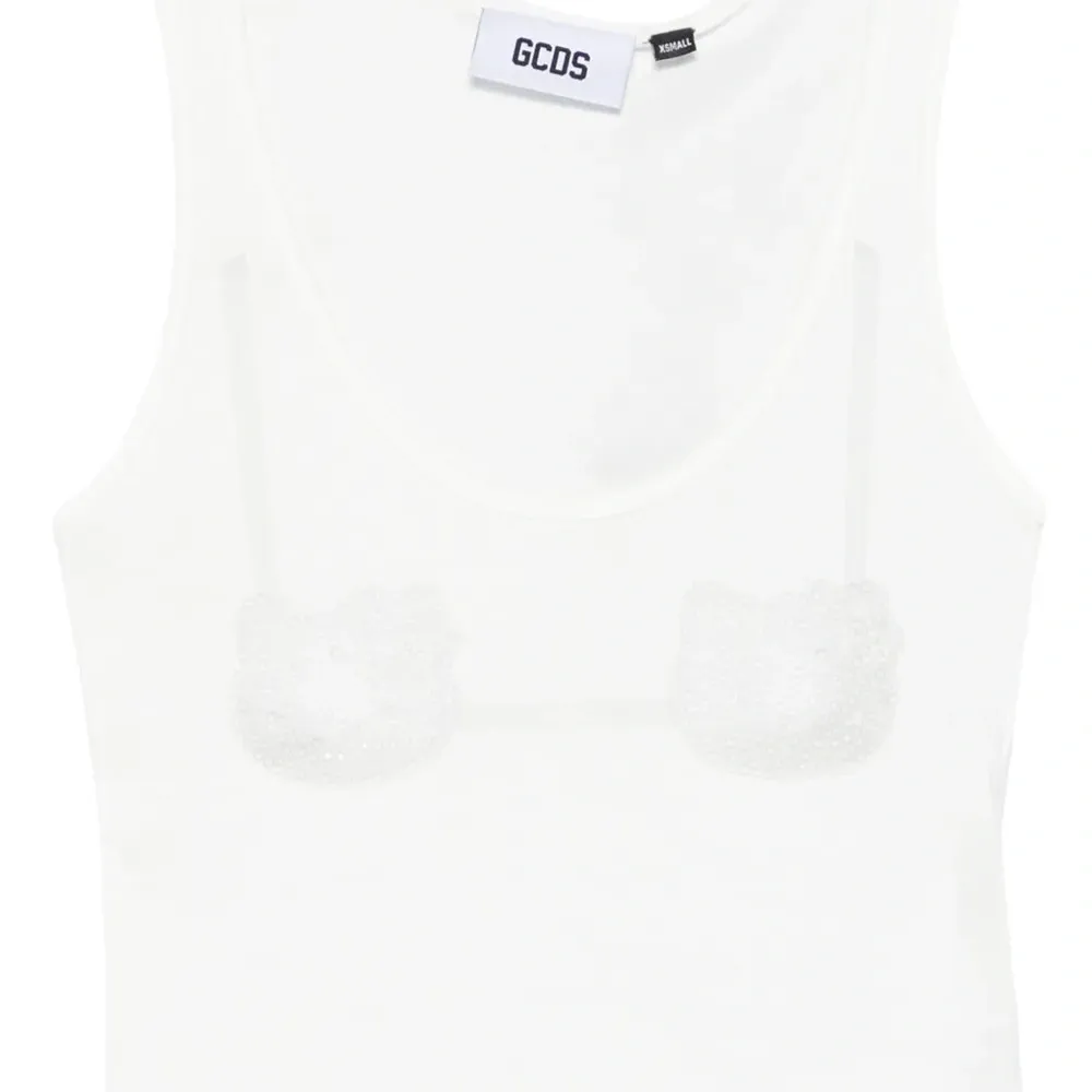 Топ с принтом из коллаборации с Hello Kitty