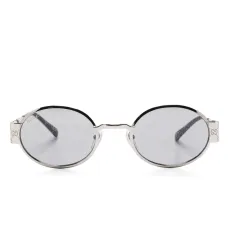 Солнцезащитные очки в круглой оправе