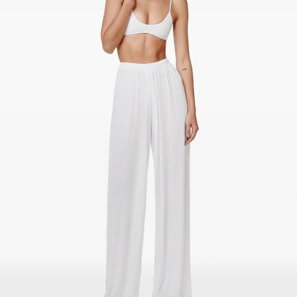 Брюки палаццо с завышенной талией