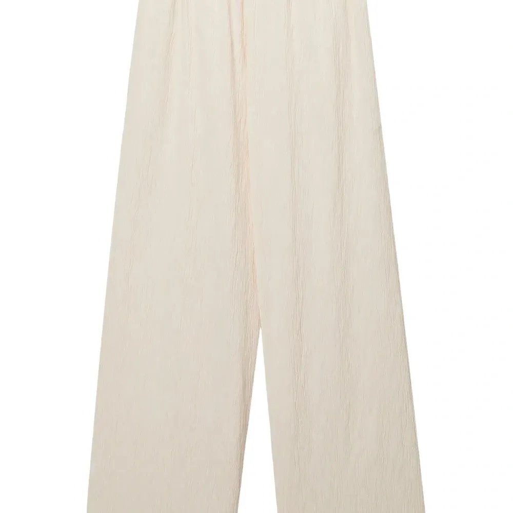 Брюки со складками