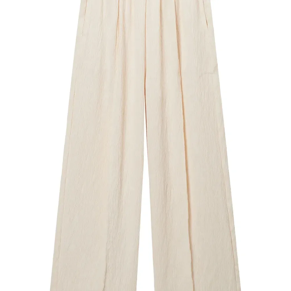 Брюки со складками