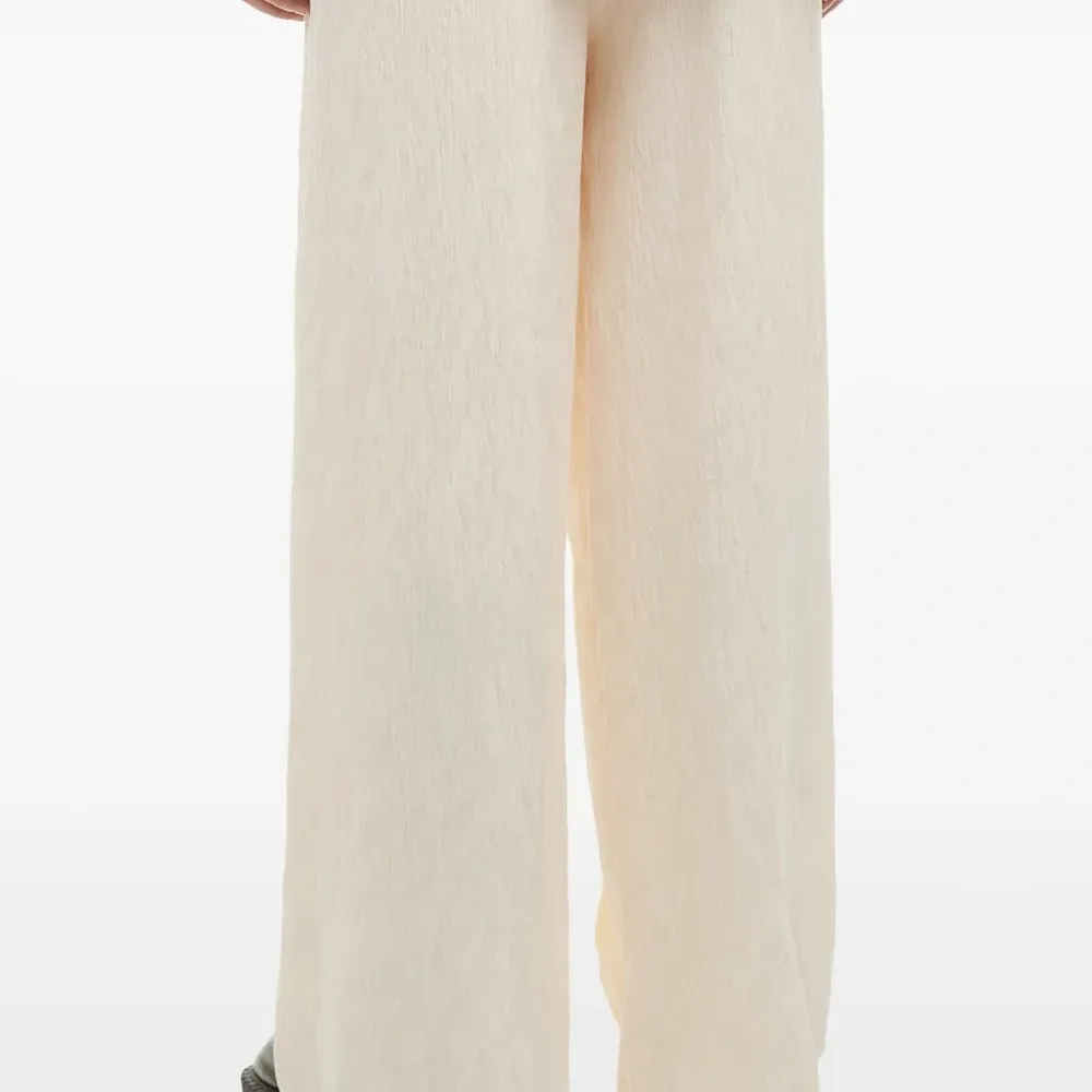 Брюки со складками