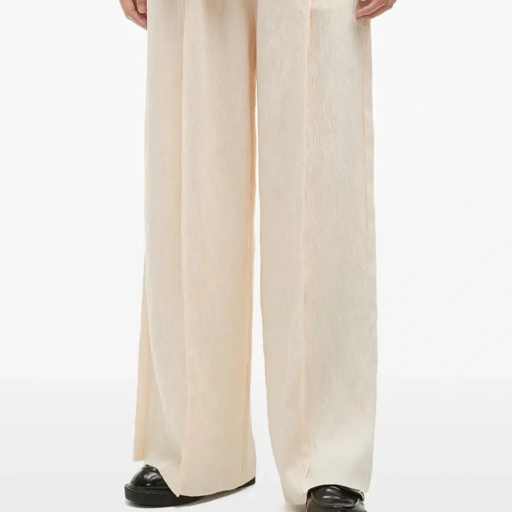 Брюки со складками