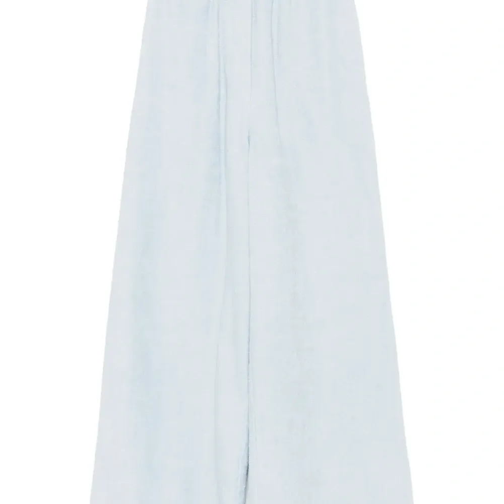 Брюки с карманами Брюки с карманами