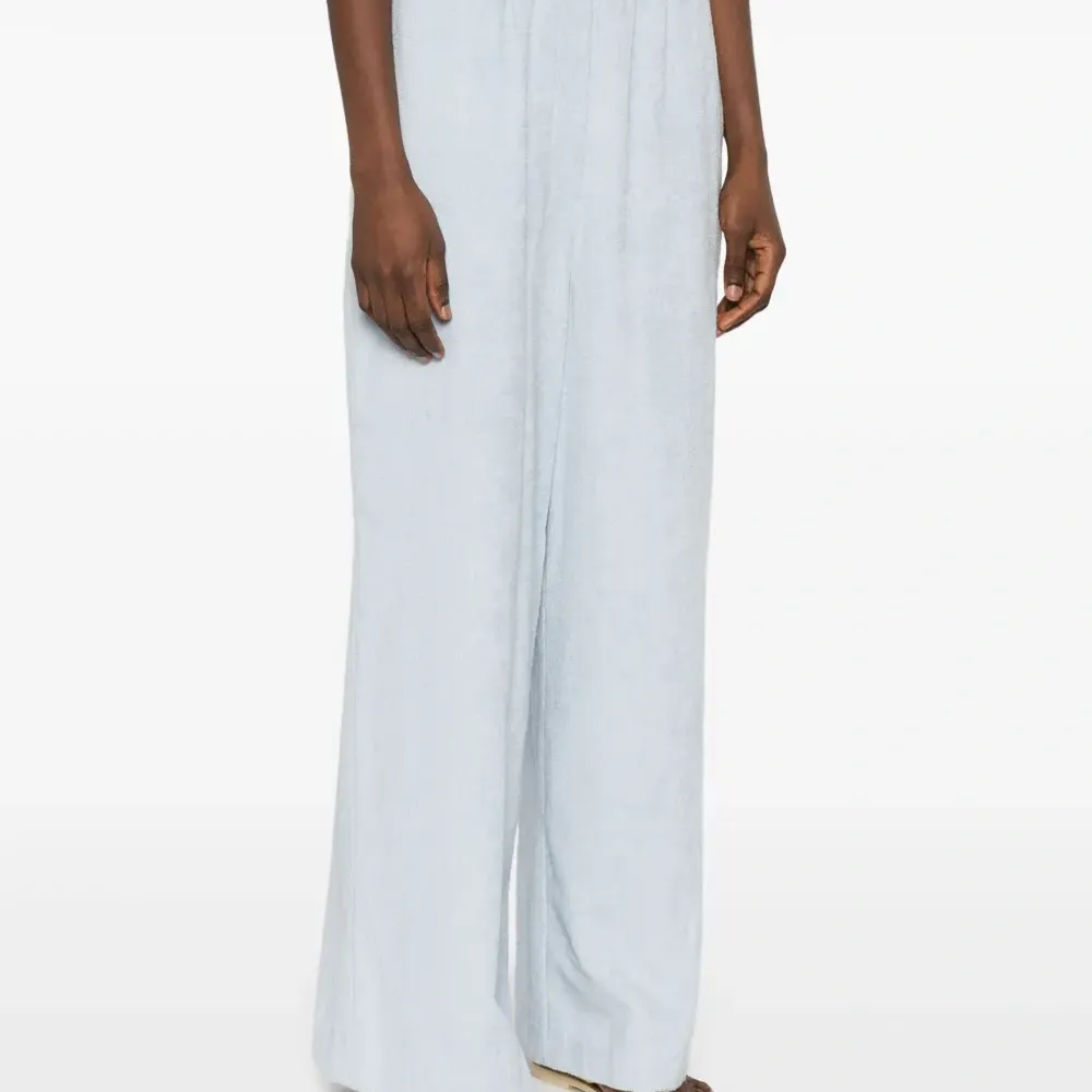 Брюки с карманами Брюки с карманами