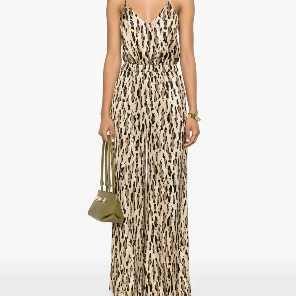 Брюки палаццо с анималистичным принтом