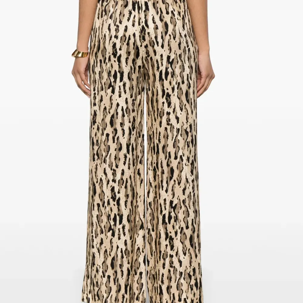 Брюки палаццо с анималистичным принтом