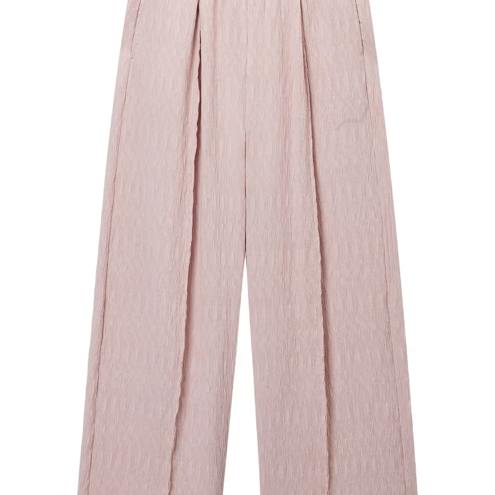 Широкие брюки со складками