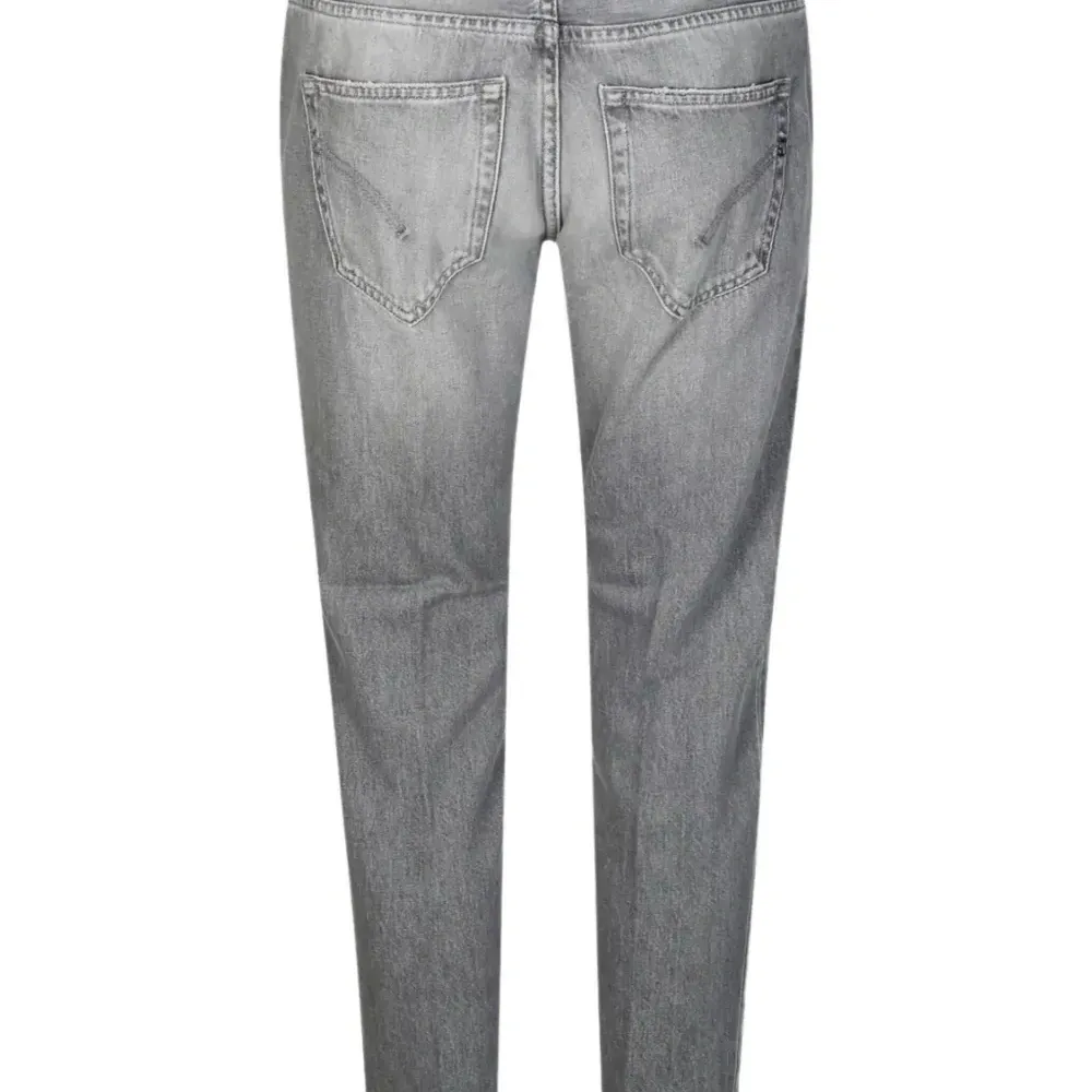 Джинсы с эффектом потертости Джинсы с эффектом потертости