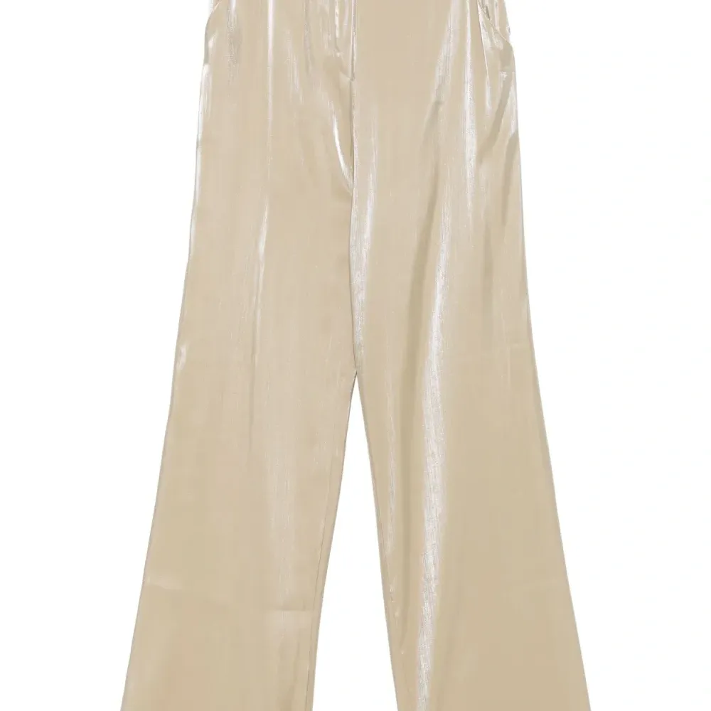 Брюки с эффектом металлик