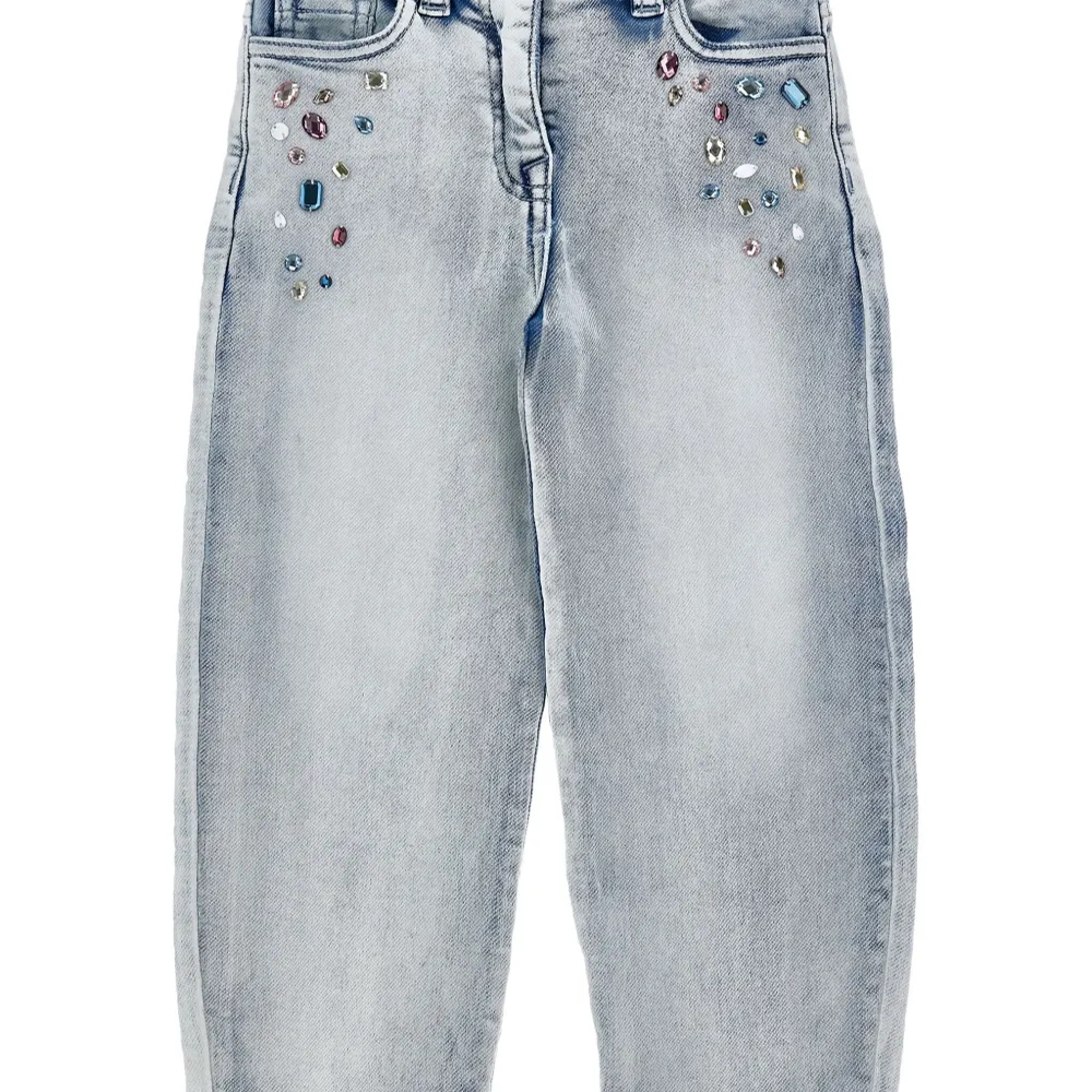 Декорированные джинсы