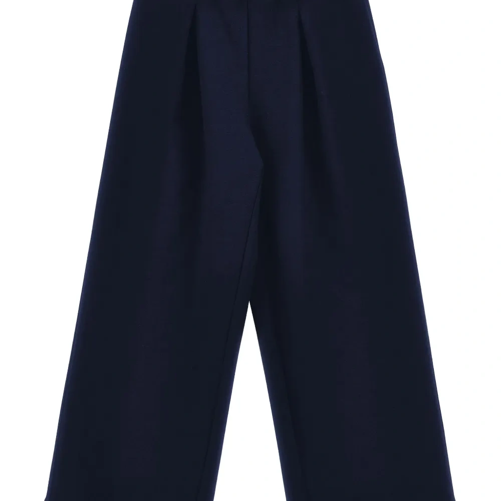 Широкие брюки со складками