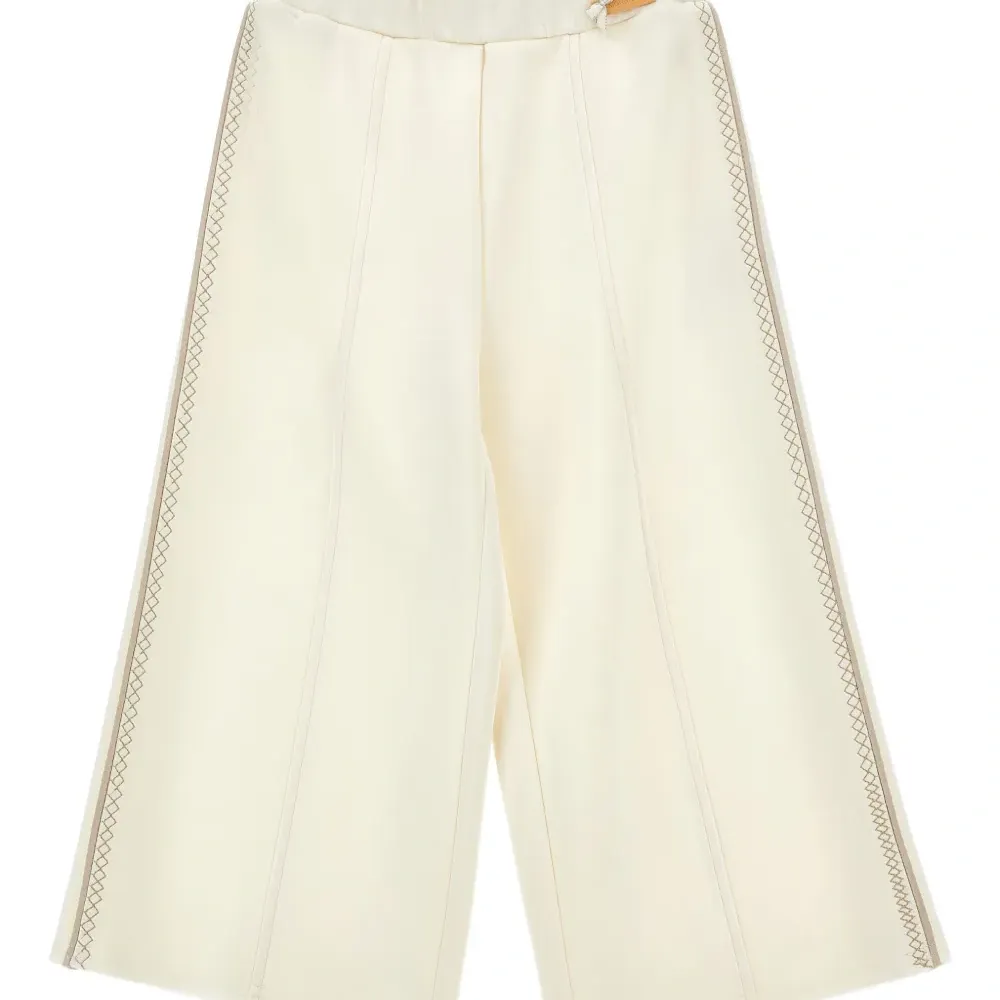 Брюки с лампасами