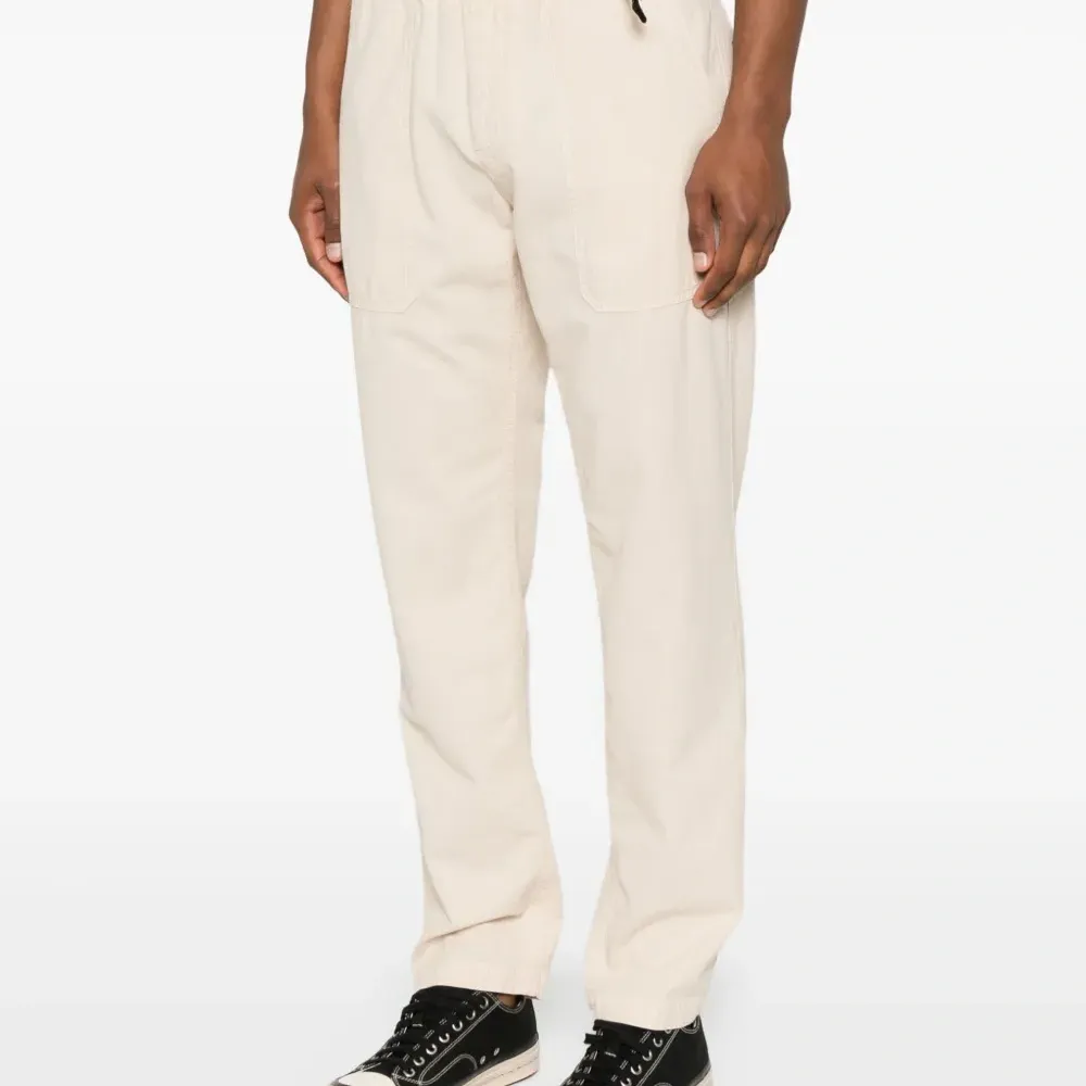 Брюки с карманами