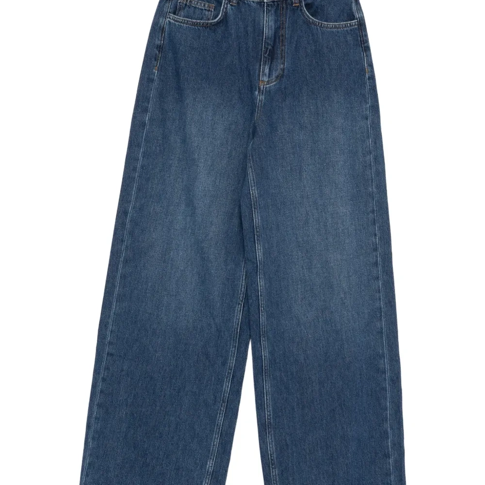 Джинсы свободного кроя (клёш)