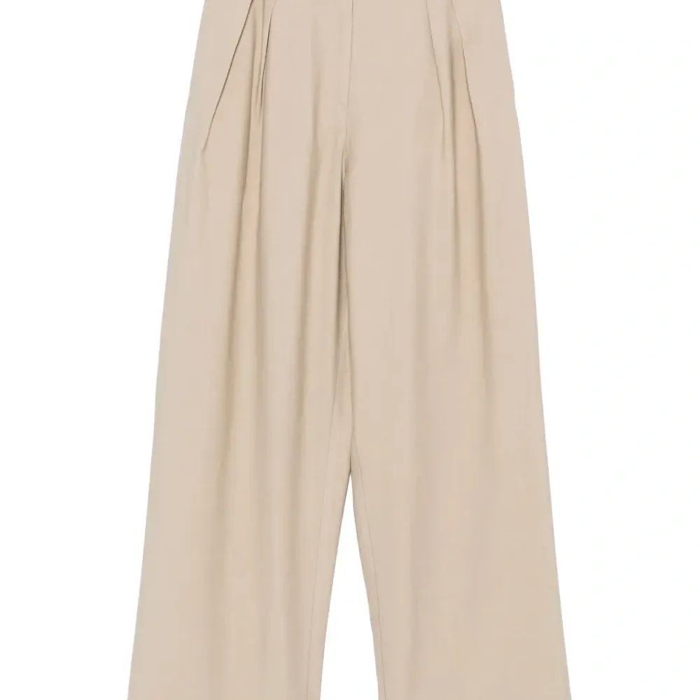 Плиссированные брюки