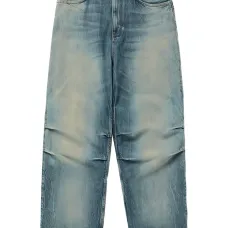 Джинсы с эффектом потертости