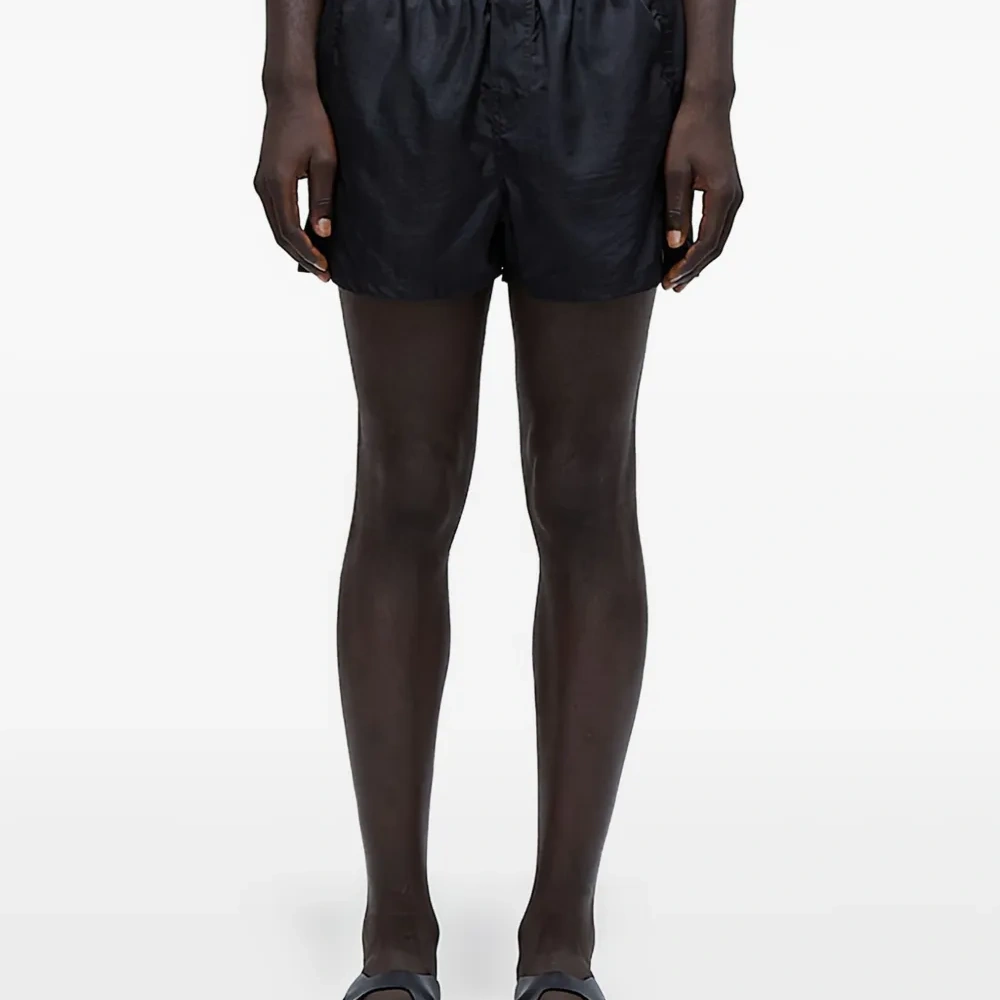 Плавательные шорты на эластичном поясе Плавательные шорты на эластичном поясе