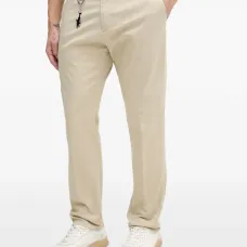 Брюки с брелоком в виде акулы