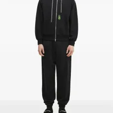 Спортивные брюки с вышивкой и манжетами