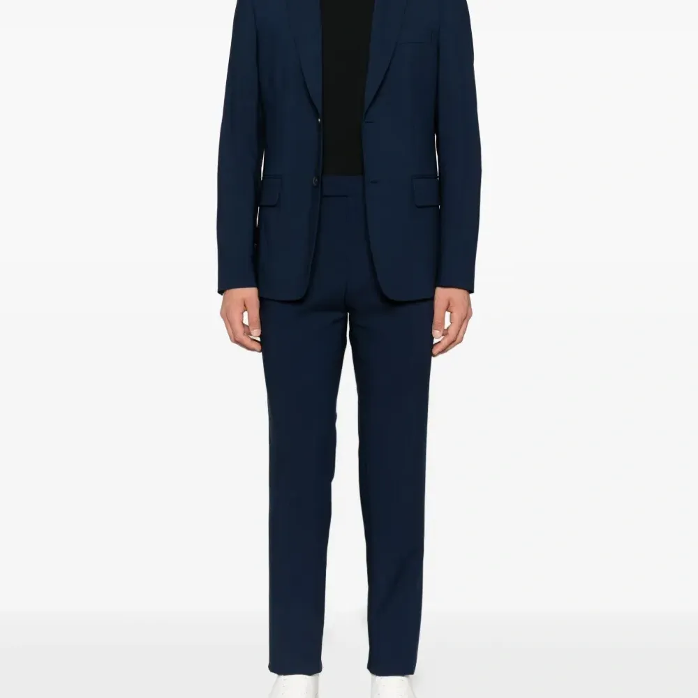 Пиджак с карманами Пиджак с карманами