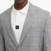 Клетчатый костюм с однобортным пиджаком
