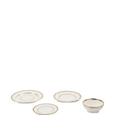 Набор Golden Finds из четырех столовых приборов Набор Golden Finds из четырех столовых приборов