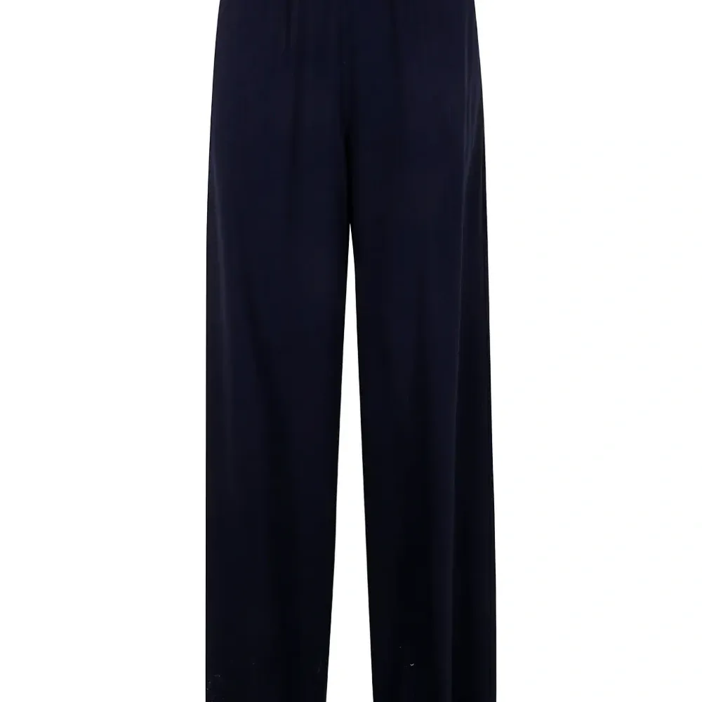 Брюки со складками