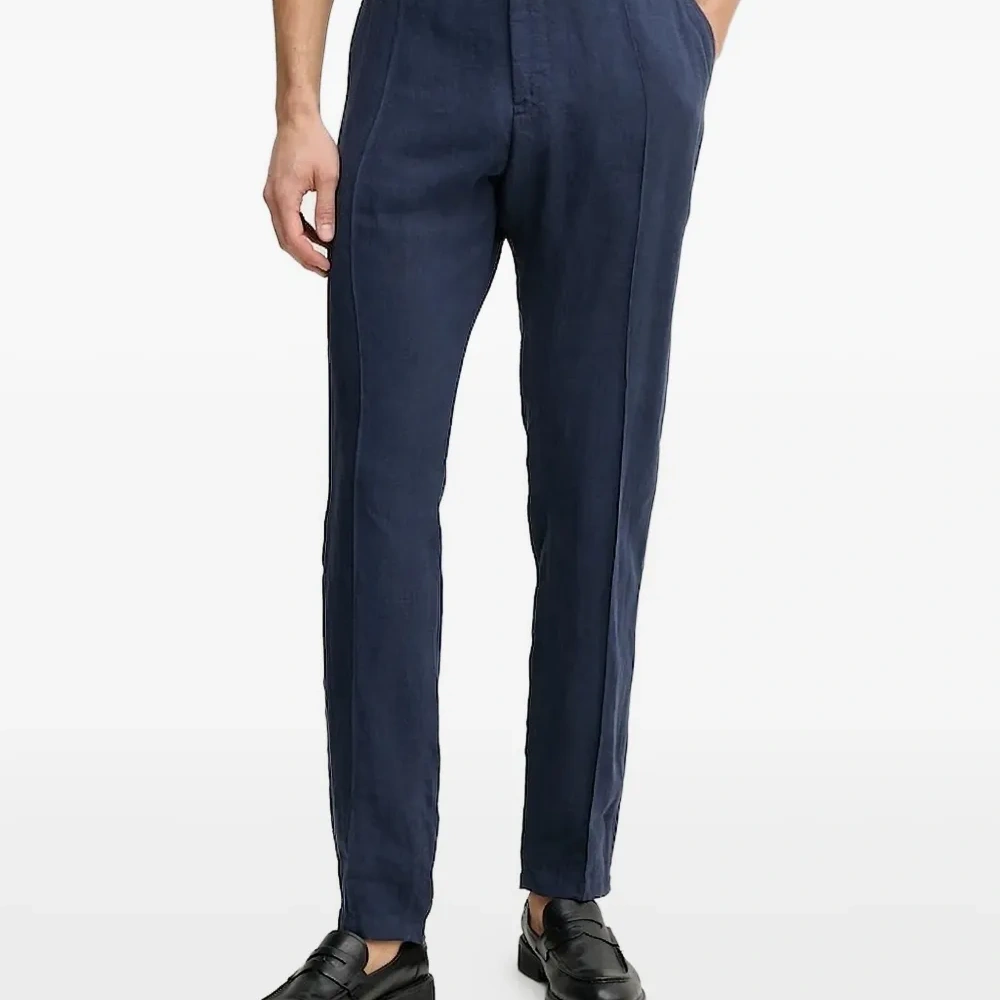 Плиссированные брюки Плиссированные брюки