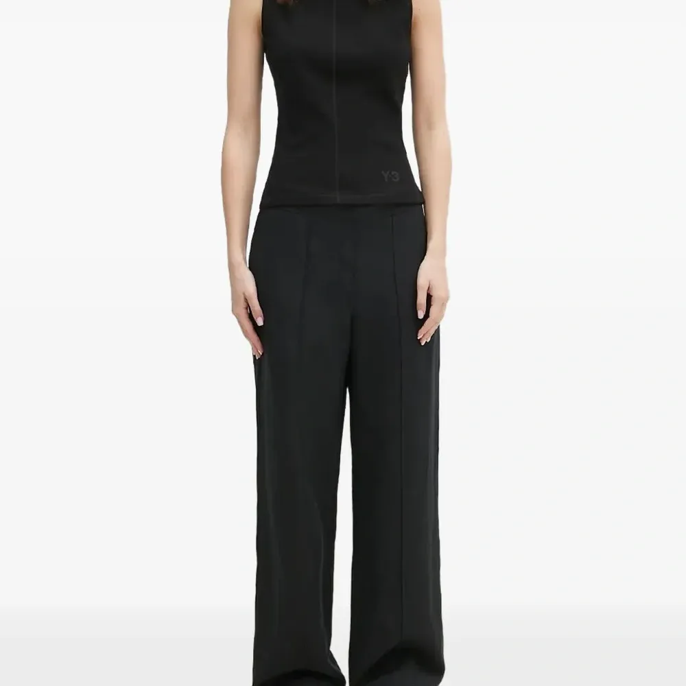 Брюки с эластичным поясом и складками