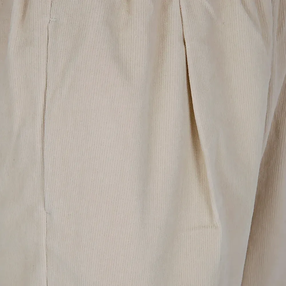 Плиссированные брюки Плиссированные брюки