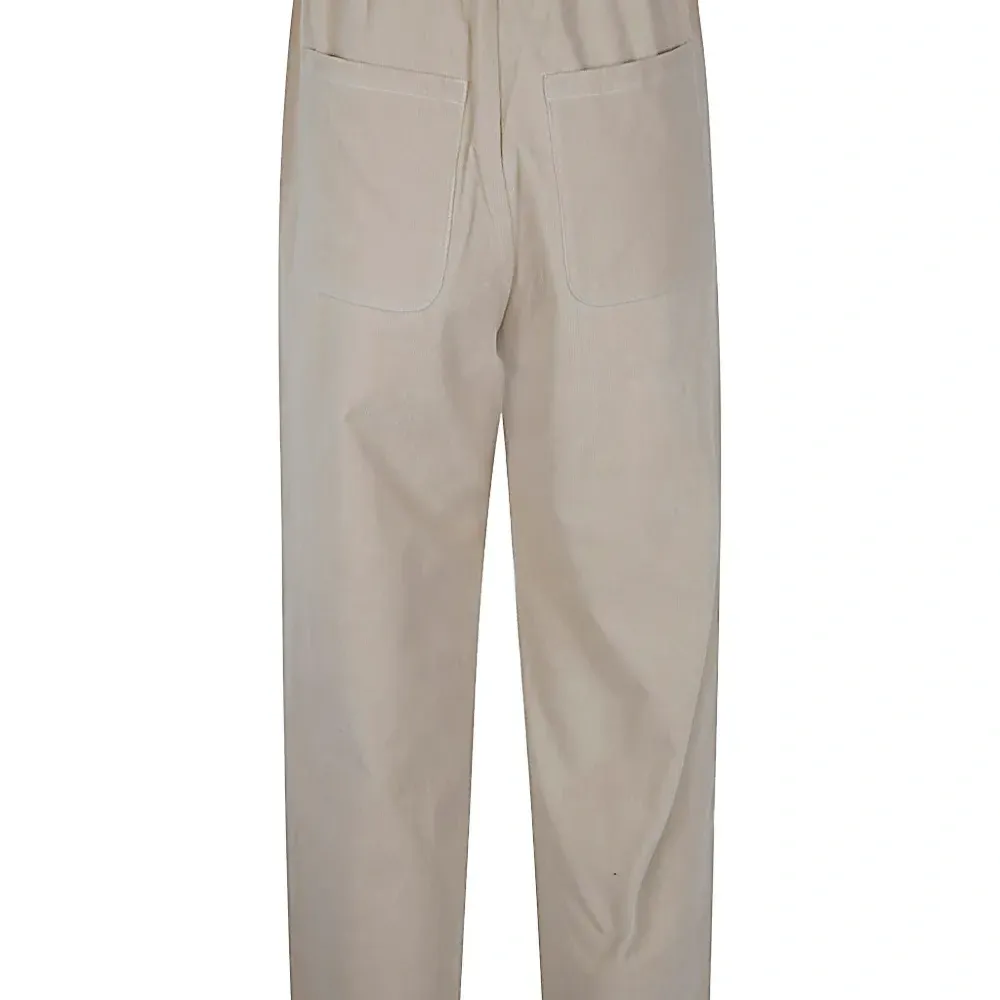 Плиссированные брюки Плиссированные брюки