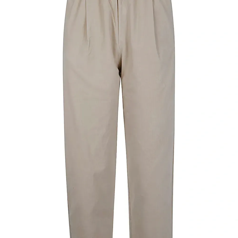 Плиссированные брюки Плиссированные брюки