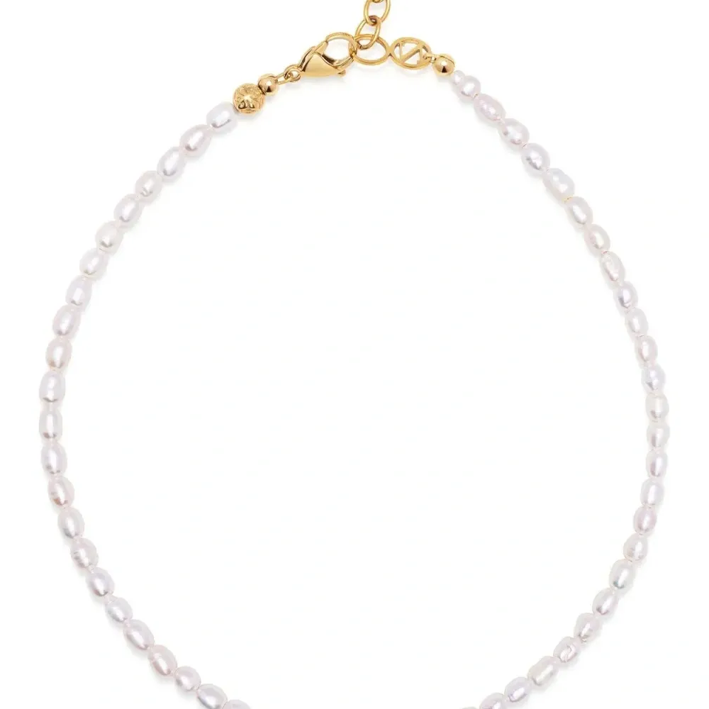 Колье с жемчугом Колье с жемчугом